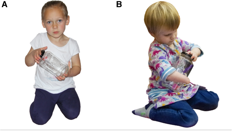 two children with different physical experiences. One child  has two functional hands whereas the other child has one functional hand. 